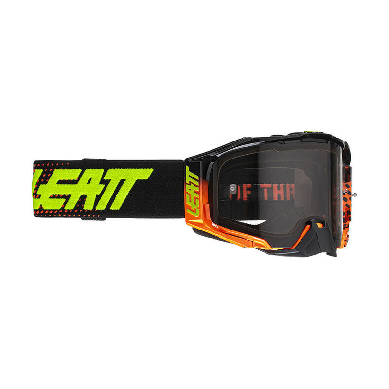 Oculos Leatt Velocity 6.5 Laranja Fluo 58% Óculos de proteção Leatt com lente escura e faixa preta com texto amarelo