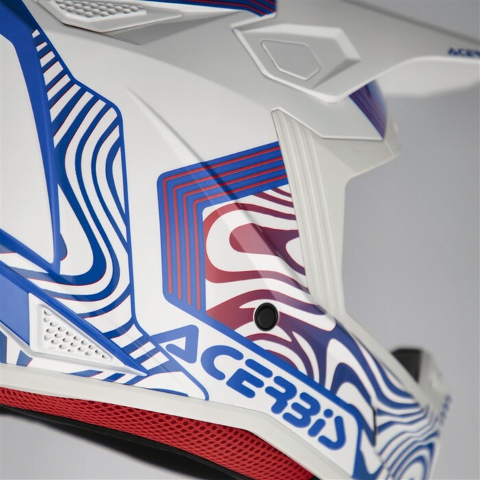 Capacete Acerbis Whoops Graphic Azul Branco Capacete branco com detalhes gráficos azuis e vermelhos e texto Acerbis