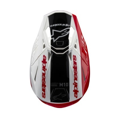 Capacete motocross branco, preto e vermelho com texto 'alpinestars' e 'SUBSQUARE M10'