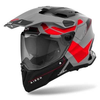 Capacete de motociclista cinzento, preto e vermelho com viseira transparente e texto AIROH.