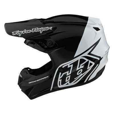 Capacete de motocross preto e branco da marca Troy Lee Designs