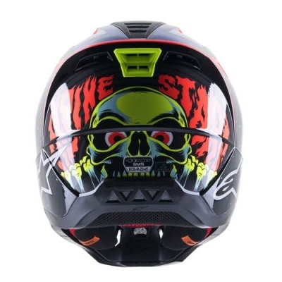 Capacete de motocicleta preto com desenho gráfico de caveira verde e texto vermelho