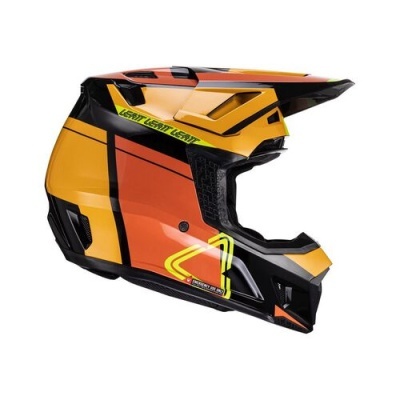 Capacete motocross laranja e preto com texto LEATT e símbolo triangular amarelo.
