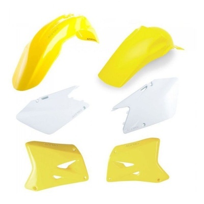 Peças plásticas amarelas e brancas para mota sobre fundo branco