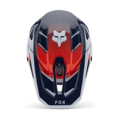 Capacete desportivo azul, vermelho e branco com logotipo de raposa e texto FOX.