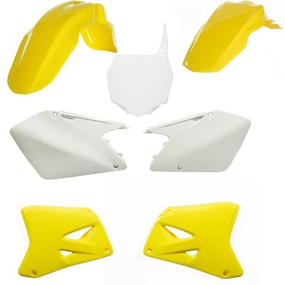 Peças de plástico para moto em amarelo e branco dispostas sobre fundo branco