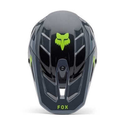 Capacete de ciclismo preto com detalhes verdes e logo FOX