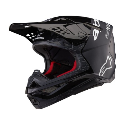Capacete integral motocross preto com detalhes brancos e interior acolchoado vermelho