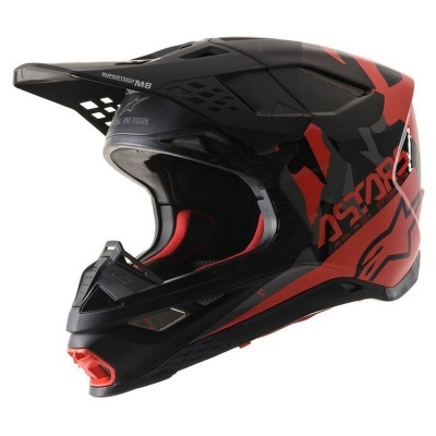 Capacete integral preto e vermelho para motociclismo com padrões geométricos e texto ASTARS