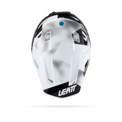 Capacete branco e preto com padrão de pontos negros e texto LEATT