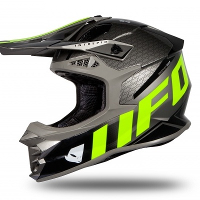 Capacete integral preto com detalhes cinzento e amarelo fluorescente para motocross.