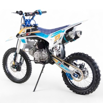 Motocross branco e azul com pneus de tacos e escape duplo