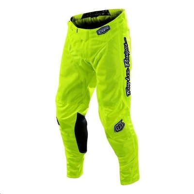 Calças desportivas amarelo fluorescente com texto Troy Lee Designs