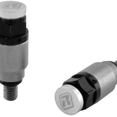 Amortecedores de suspensão para bicicleta em metal prateado e preto com tampa cinza e letra R