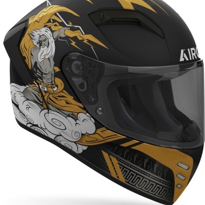 capacete de motociclista preto e dourado com visor transparente e gráfico mitológico