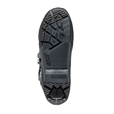 Sola de bota preta com marca CETI e padrão geométrico