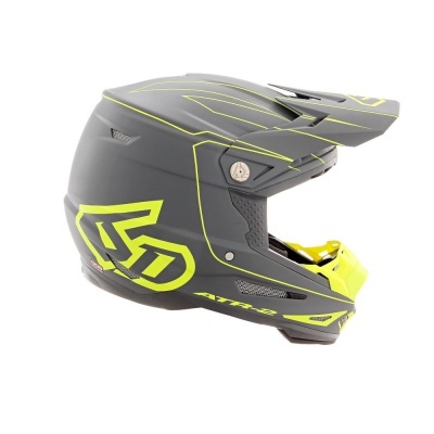 Capacete integral motocross preto com detalhes amarelos e visor ajustável