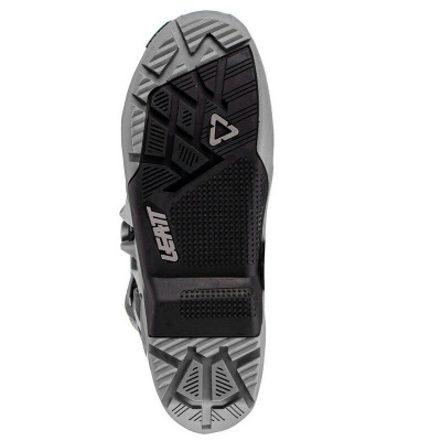 Sola de sapato desportiva preta e cinzenta com padrão antiderrapante e texto LEATT