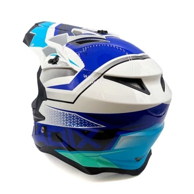 Capacete de motocross azul, branco, verde e preto com padrões geométricos