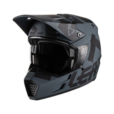 Capacete motocross integral cinza e preto com padrão geométrico e texto LEATT