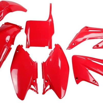 Conjunto de peças plásticas vermelhas para mota