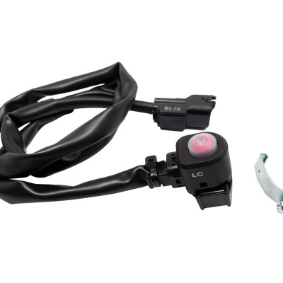 Campainha de bicicleta preta com botão vermelho e suporte metálico