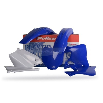 Conjunto de peças plásticas para mota azul e branco com caixa Polisport ao fundo