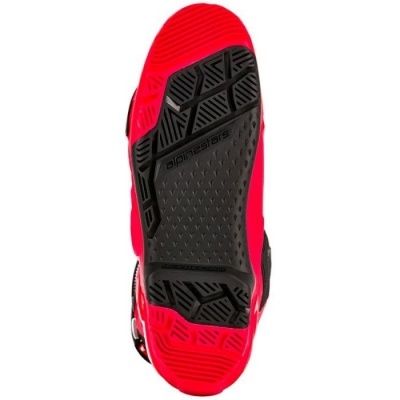 Sola de sapato de desporto vermelha com borracha preta e texto 'alpinestars'