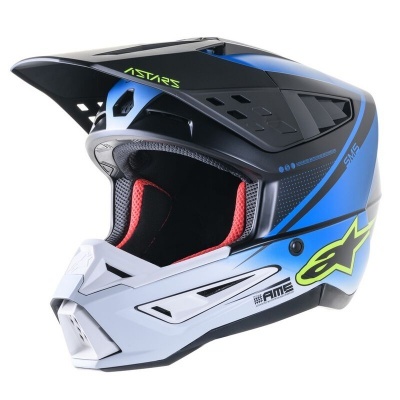 Capacete de motocross azul, cinza e preto com detalhes amarelos e vermelhos
