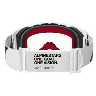 Óculos de proteção ALPINESTARS com fita branca ajustável e texto visível.
