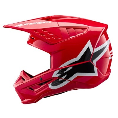 Capacete integral de motocross vermelho com logo alpinestars e padrão gráfico colorido