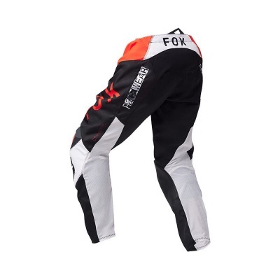 Calças de motocross preto, branco e vermelho com texto FOX e RACING WEAR