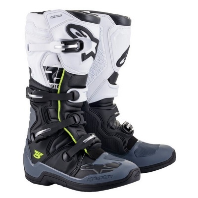 Botas motorizadas alpinestars pretas, brancas e cinza com fechos rápidos e detalhes verdes