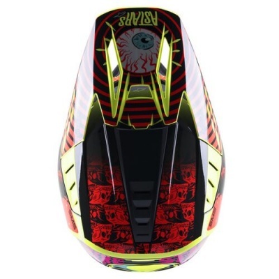 Capacete de motocross colorido com gráfico de olho azul, caveiras vermelhas e detalhes amarelos.