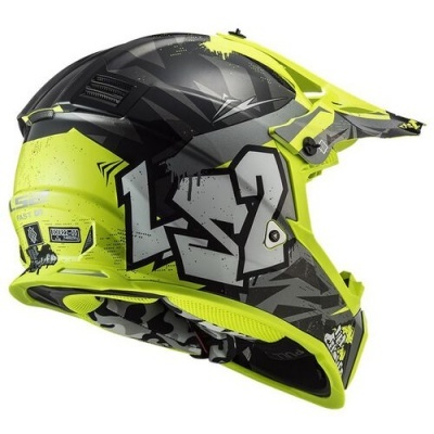 Capacete integral motocross preto e amarelo fluorescente com grafismos e texto 'FAST' e 'K3'
