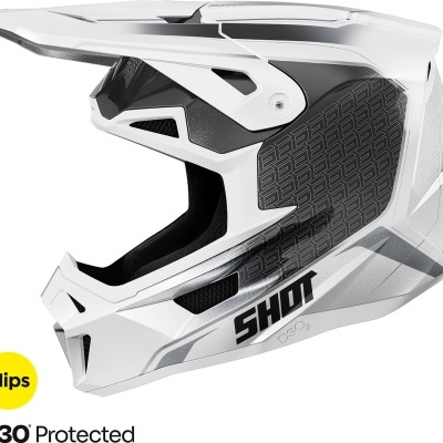 Capacete de motocross em branco e preto com visor e padrão geométrico