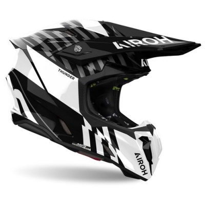 Capacete integral de motocross preto e branco com texto AIROH e THUNDER