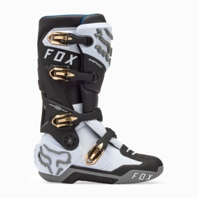 Bota motard FOX preto e branco com detalhes dourados, fechos ajustáveis.