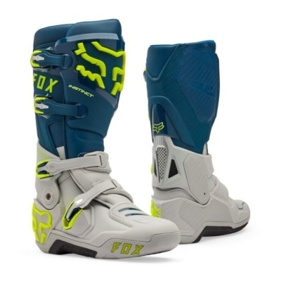 Botas de motocross azul escuro, cinza e amarelo com fivelas e logo FOX