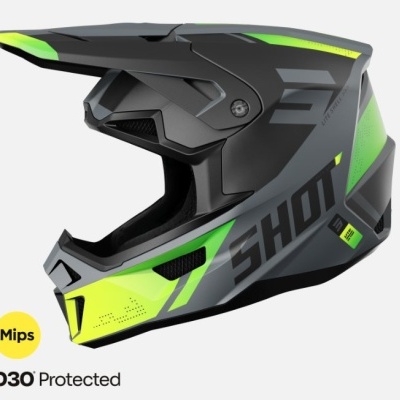 Capacete integral para motocross preto e verde neon com marca SHOT e proteção Mips