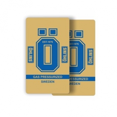 Tarjas amarelas com logotipo da marca Öhlins e texto azul.