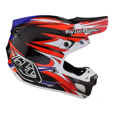 Capacete integral de motocross preto, vermelho, branco e azul com texto 'Troy Lee Designs' e logo 'TLD'.
