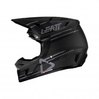 Capacete integral de motocross preto com padrão tipo fibra de carbono e texto LEATT