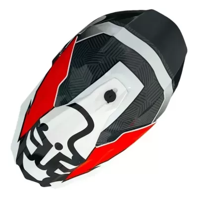 Capacete de motocross preto, vermelho e branco com padrões geométricos e gráfico preto.