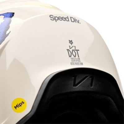 Capacete de mota branco com texto Speed Div. e certificações, etiqueta amarela Mips, interior preto acolchoado