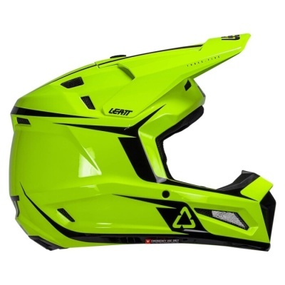 Capacete integral de motocross verde fluorescente com detalhes pretos e visor ajustável.