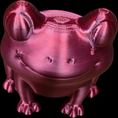 Figura decorativa em forma de rã rosa metálica