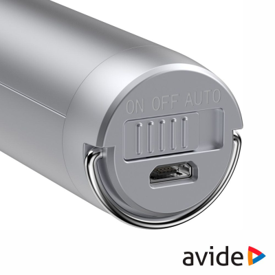 Objeto cilíndrico metálico com interruptor e porta USB