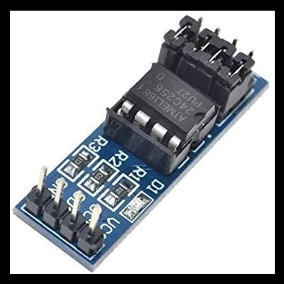 Placa eletrónica azul com chip preto, pinos dourados e resistores visíveis