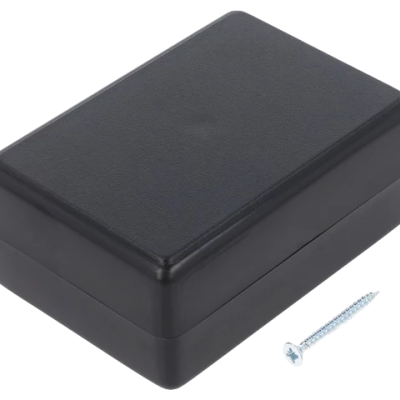 Caixa preta retangular com parafuso azul ao lado